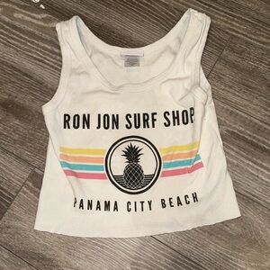 IT IS NOT STAINED I PINKY PROMIS. This shirt is loose but short